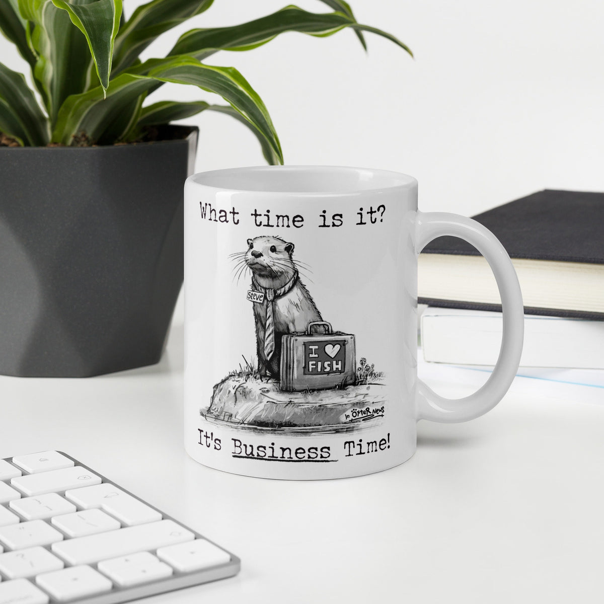 Business Time otter mug, 11 oz, on a desk with a plant and books: Steve with his briefcase