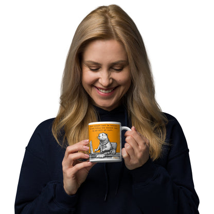 Woman enjoying a drink from The Escape Key mug