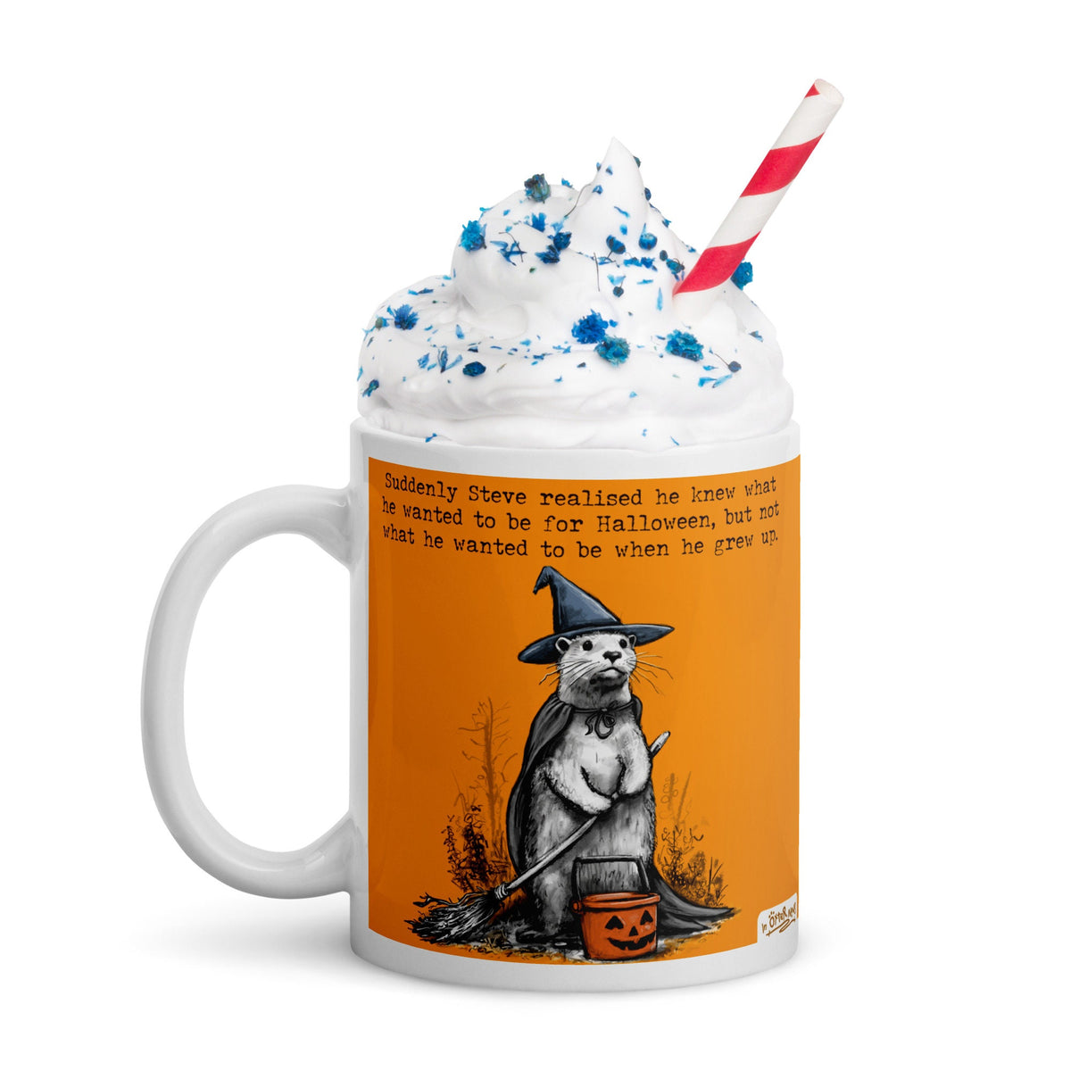 Halloween mug topped with whipped cream and sprinkles