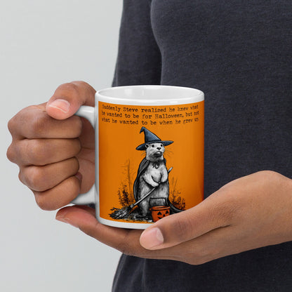 Holding the Halloween otter mug