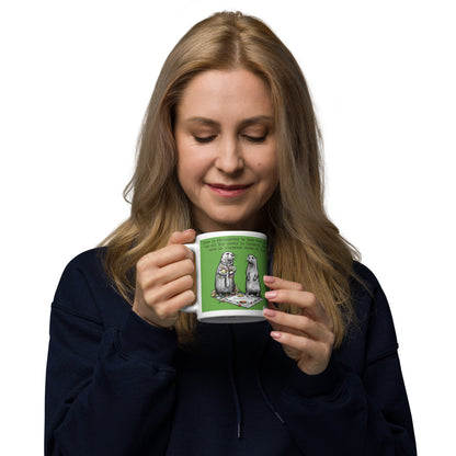 Woman enjoying a drink from the Monopoly mug