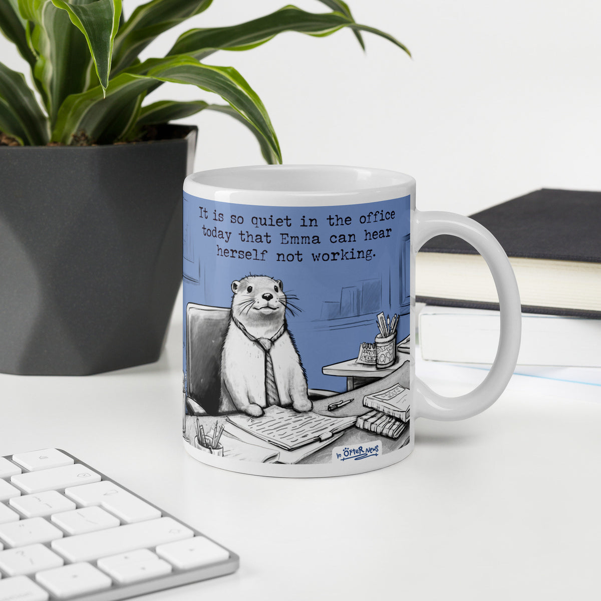 Custom name otter mug on a desk, made with a customer's name in place of Steve