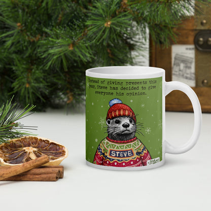 Christmas Opinions otter mug, 11 oz, in front of a Christmas tree: Steve in a festive jumper and bobble hat