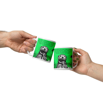 Two T-Rex mugs being passed between hands
