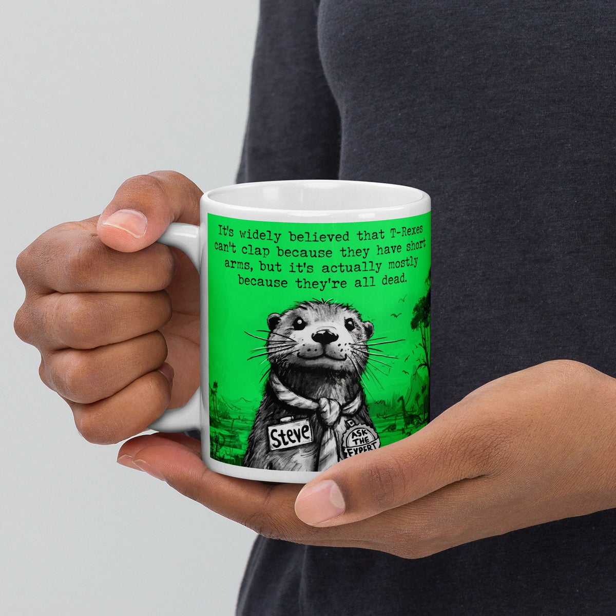 Holding the T-Rex otter mug