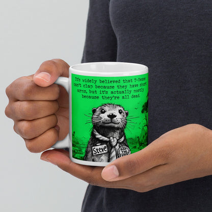 Holding the T-Rex otter mug