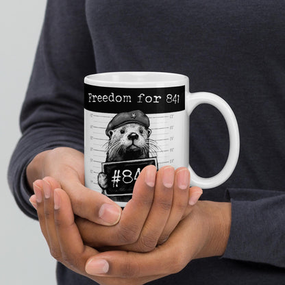 Holding the Otter 841 mug in both hands
