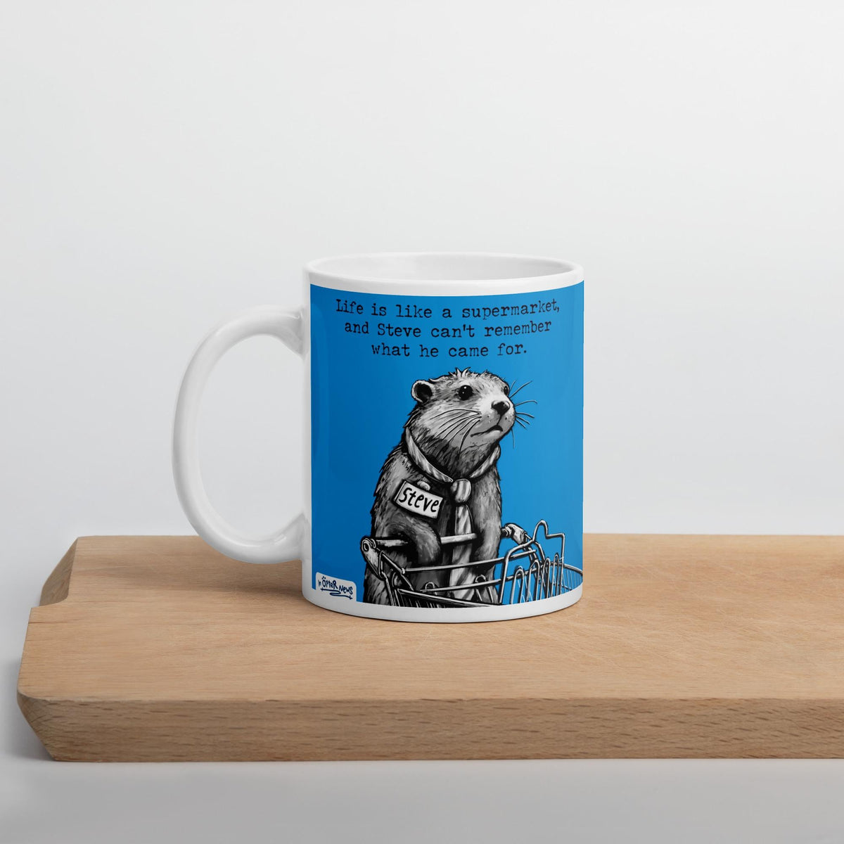 The Supermarket mug on a wooden board, side view