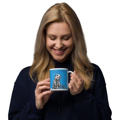 Woman enjoying a drink from The Supermarket mug