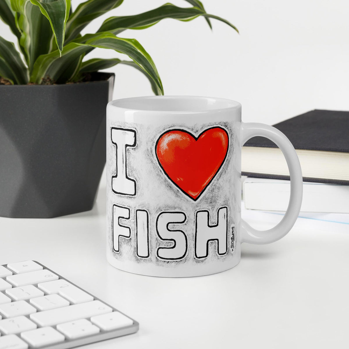 I Love Fish mug, 11 oz, with a plant and books