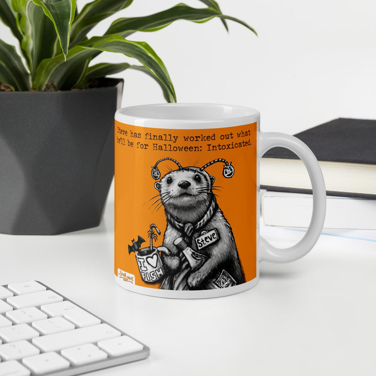 Intoxicated otter mug, 11 oz, on a desk with a plant and books: Steve's Halloween costume