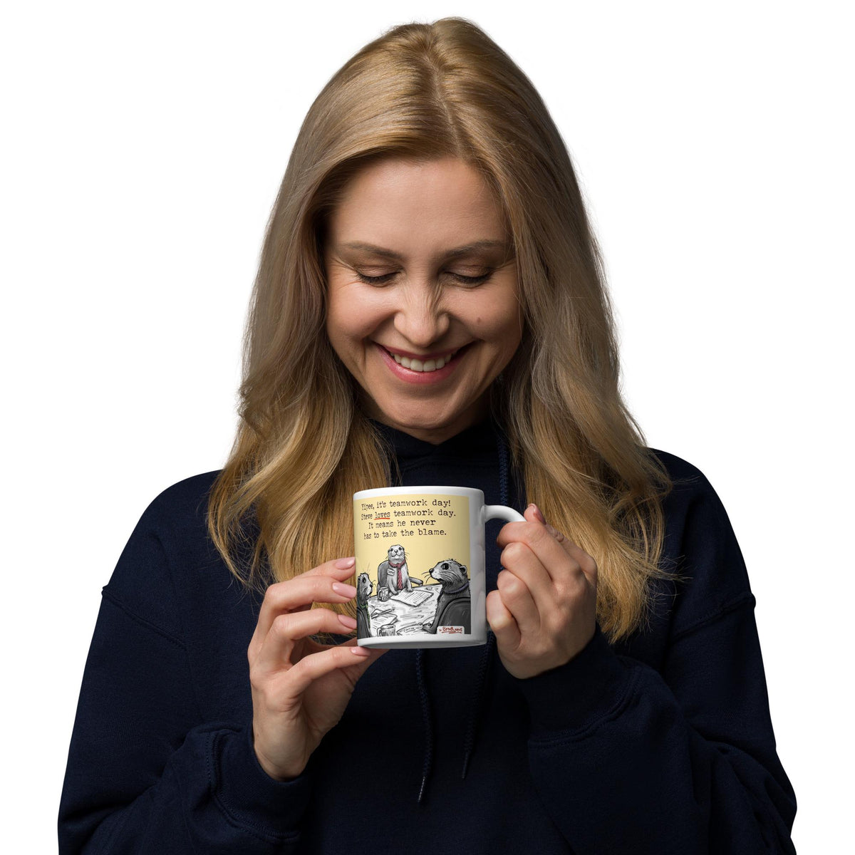 Woman enjoying a drink from the Teamwork mug