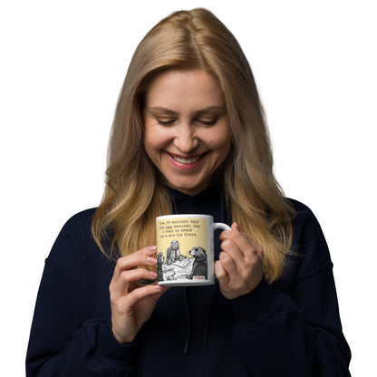Woman enjoying a drink from the Teamwork mug