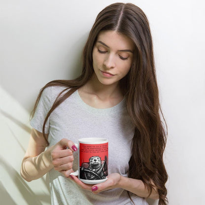 Woman holding The Gym otter mug