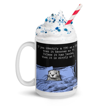 The UFO mug topped with whipped cream and sprinkles