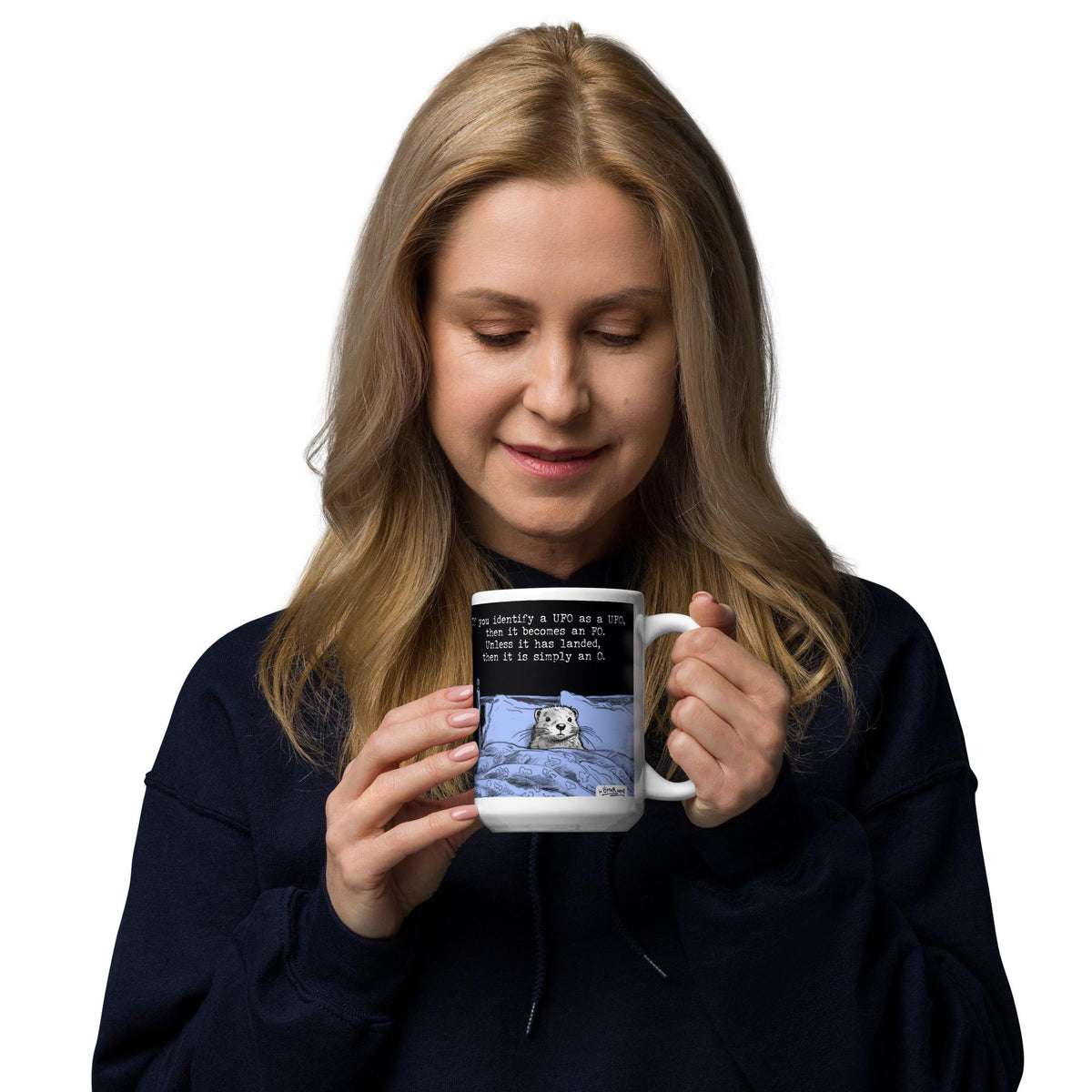 Woman smiling at her UFO otter mug