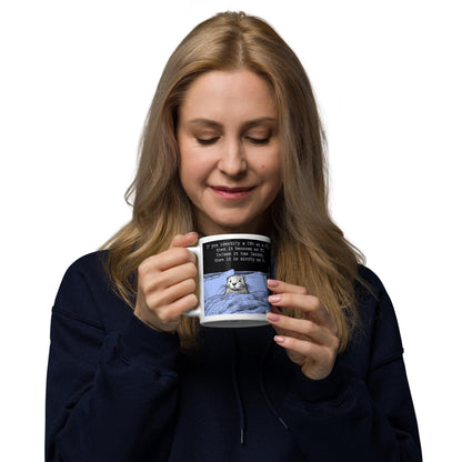 Woman enjoying a drink from The UFO mug