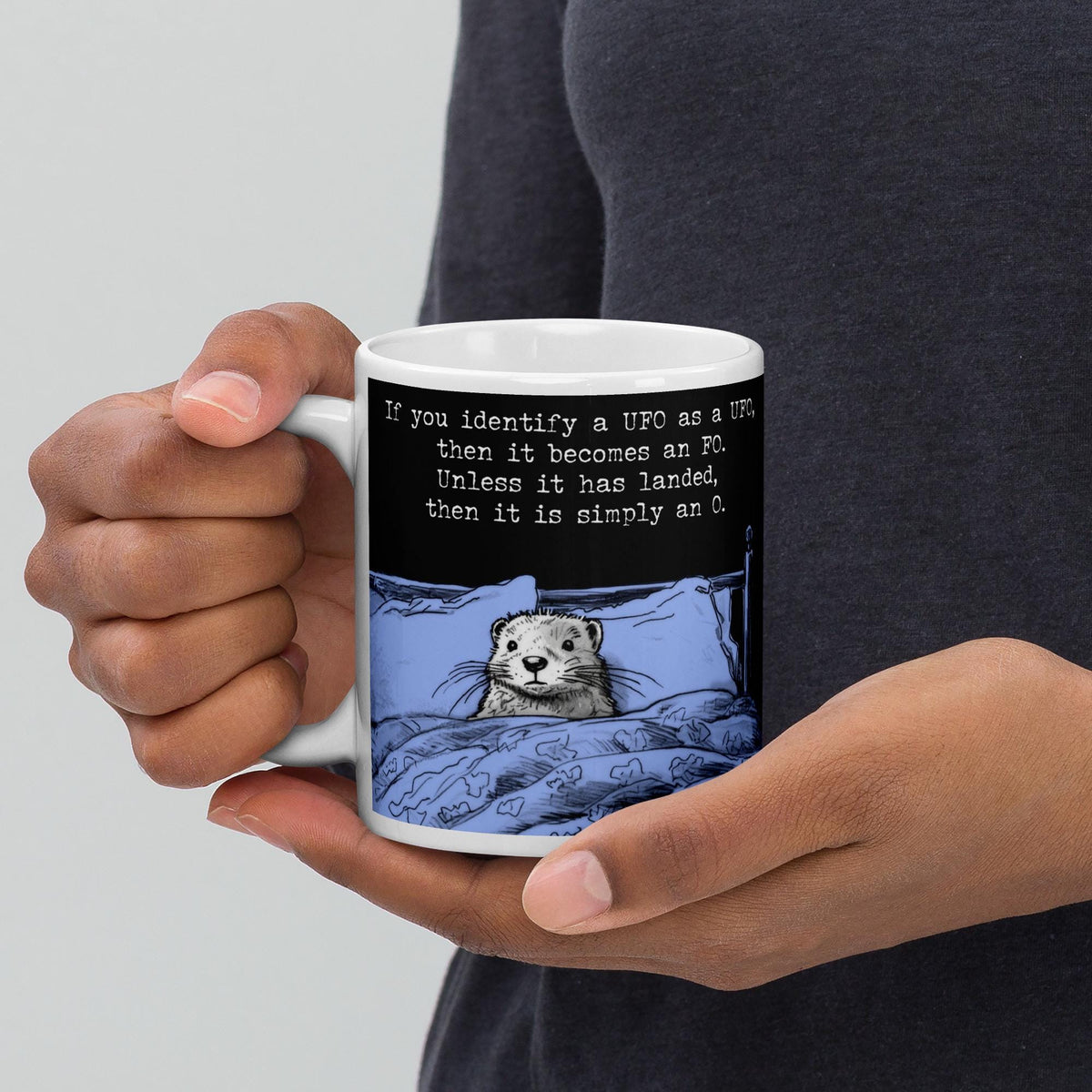 Holding The UFO otter mug