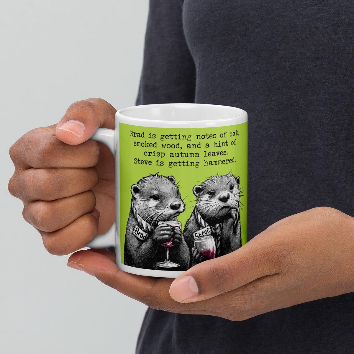 Hands holding the Hammered otter mug