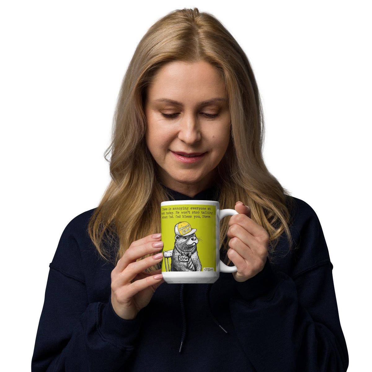 Woman holding the Finding Cod otter mug