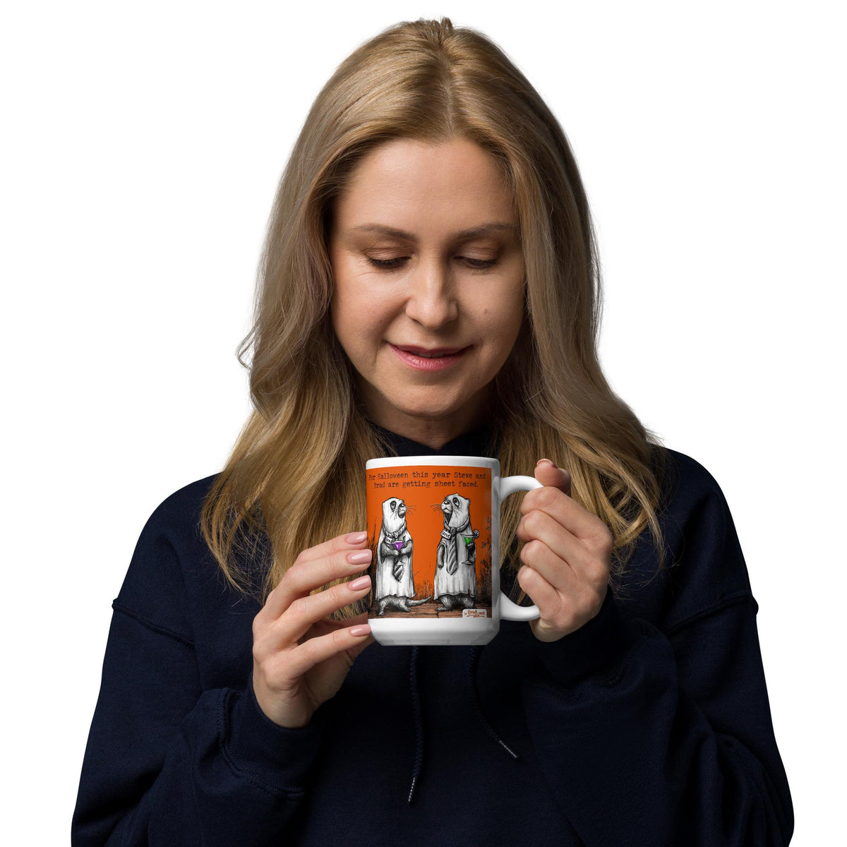 Woman enjoying a drink from the Sheet Faced mug