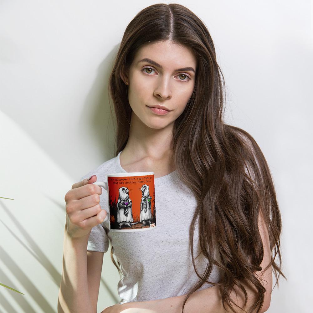 Woman holding the Sheet Faced otter mug