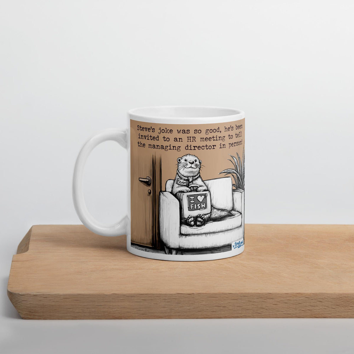 The Joke mug on a wooden board